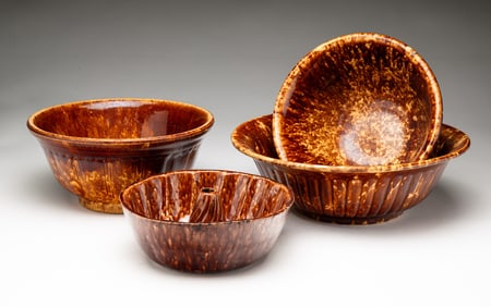 FOUR PIECES OF YELLOW WARE.