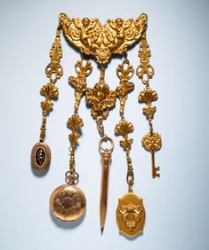PINCHBECK CHATELAINE WITH GOLD WATCH CASE.