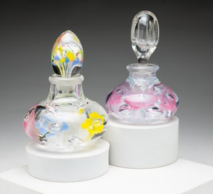 TWO PAPERWEIGHT COLOGNE BOTTLES.