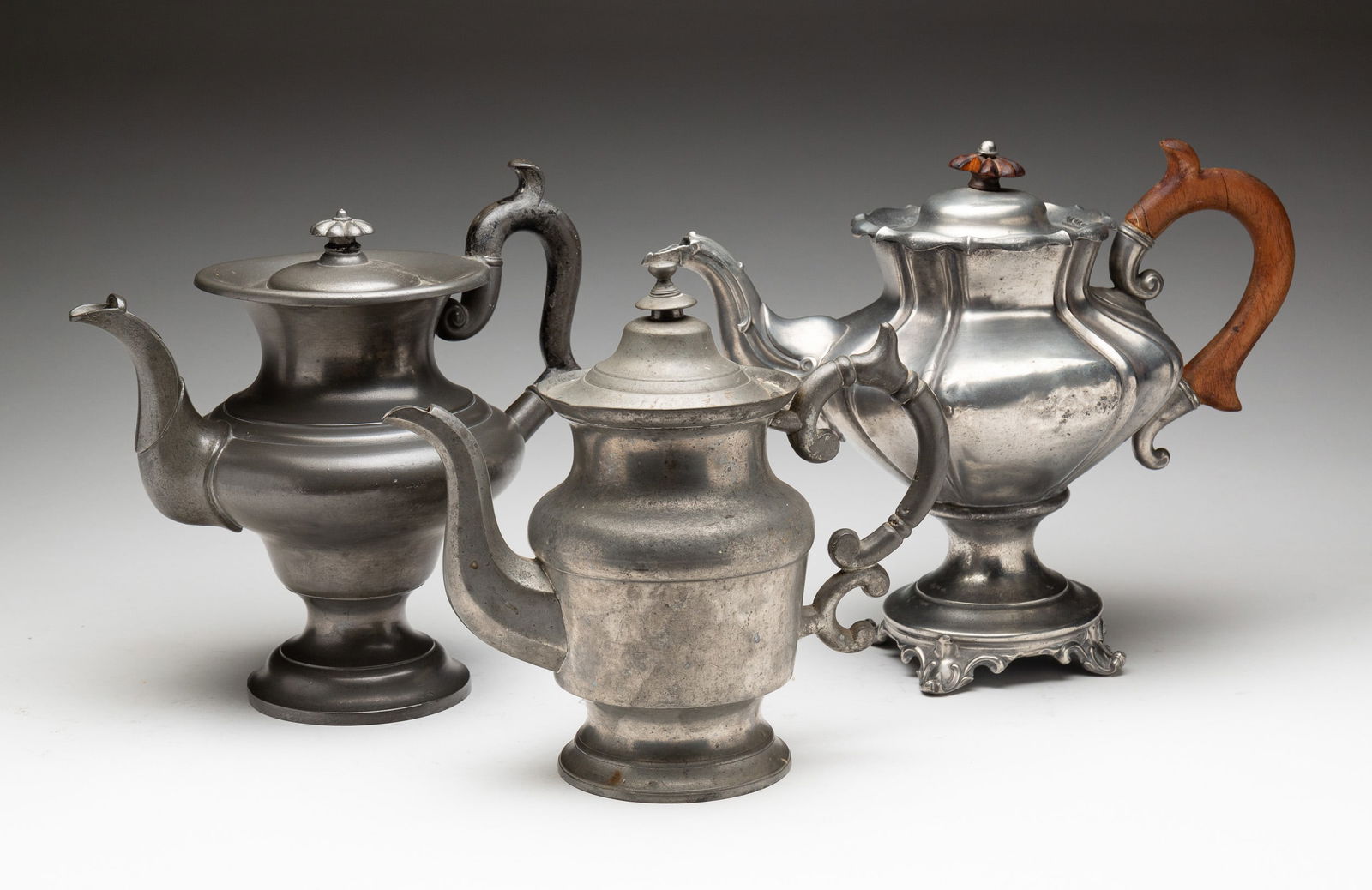 THREE PEWTER POTS. (1 of 7)
