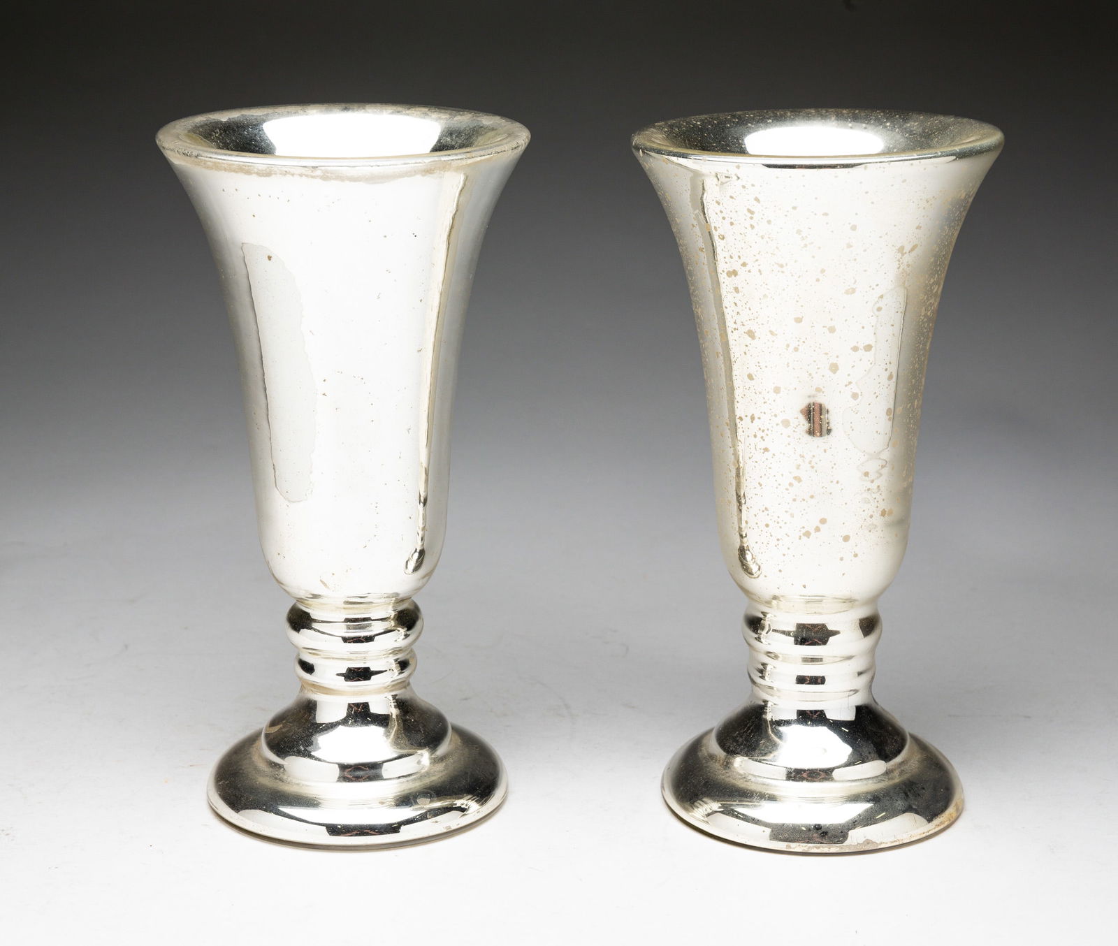 PAIR OF MERCURY GLASS TRUMPET VASES. (1 of 3)