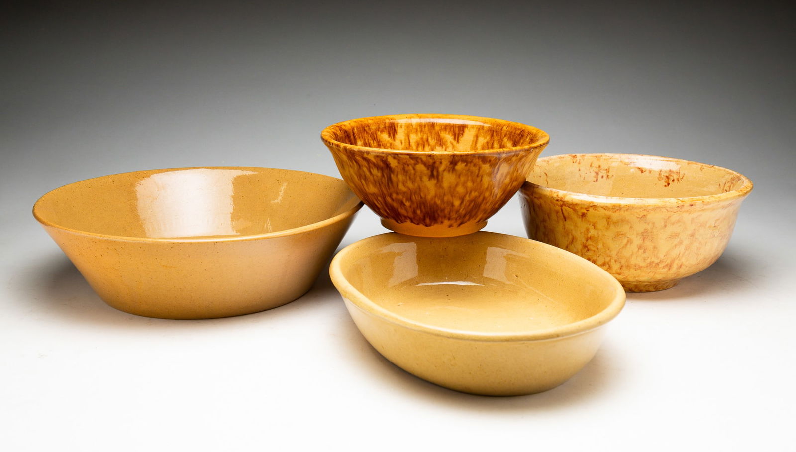 FOUR PIECES OF YELLOWWARE. (1 of 3)
