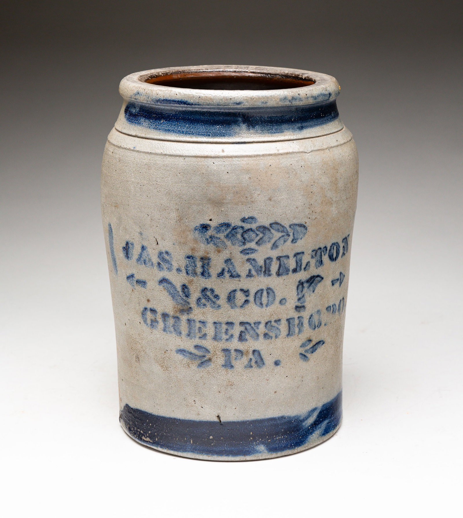 ONE GALLON HAMILTON & CO. DECORATED JAR.: Greensboro, PA. Stencil decoration and banding. Chip to interior rim. 9.5"h.