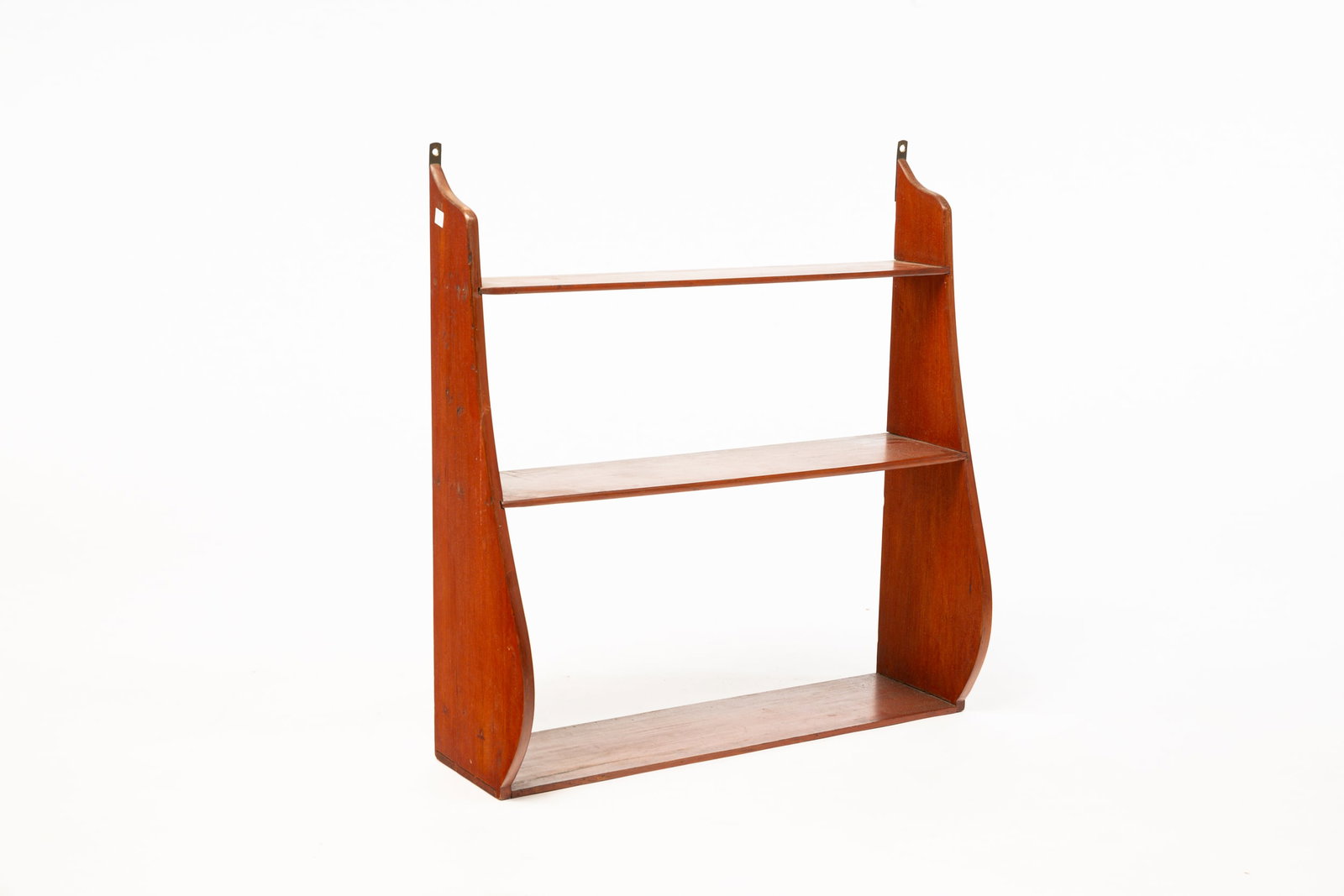 SET OF HANGING SHELVES.: American, mid 19th Century. Birch. Dovetailed frame, shaped ends and three shelves. Refinished with wear and repair. 26"h. 25.25"w. 8.25"d.