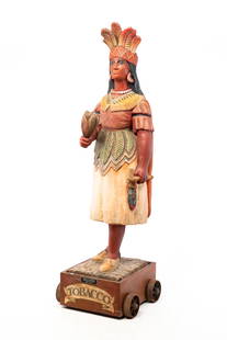 JO MEAD DESIGNS "INDIAN PRINCESS" CIGAR STORE FIGURE.: American, late 20th Century. Resin. Nicely cast detail and painted in red, buckskin and green. On a cart with iron wheels. 78"h. 20"w. 21"d.
