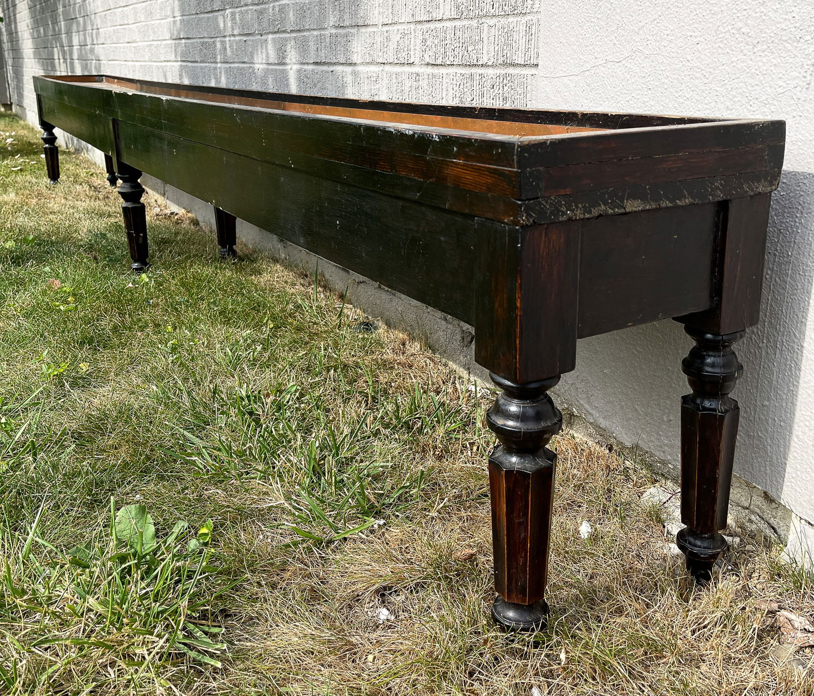 LONG BENCH LIKE PLANTER. (1 of 2)