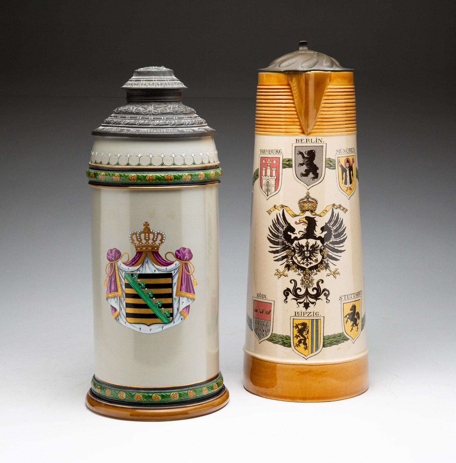 TWO METTLACH STEINS. (1 of 9)