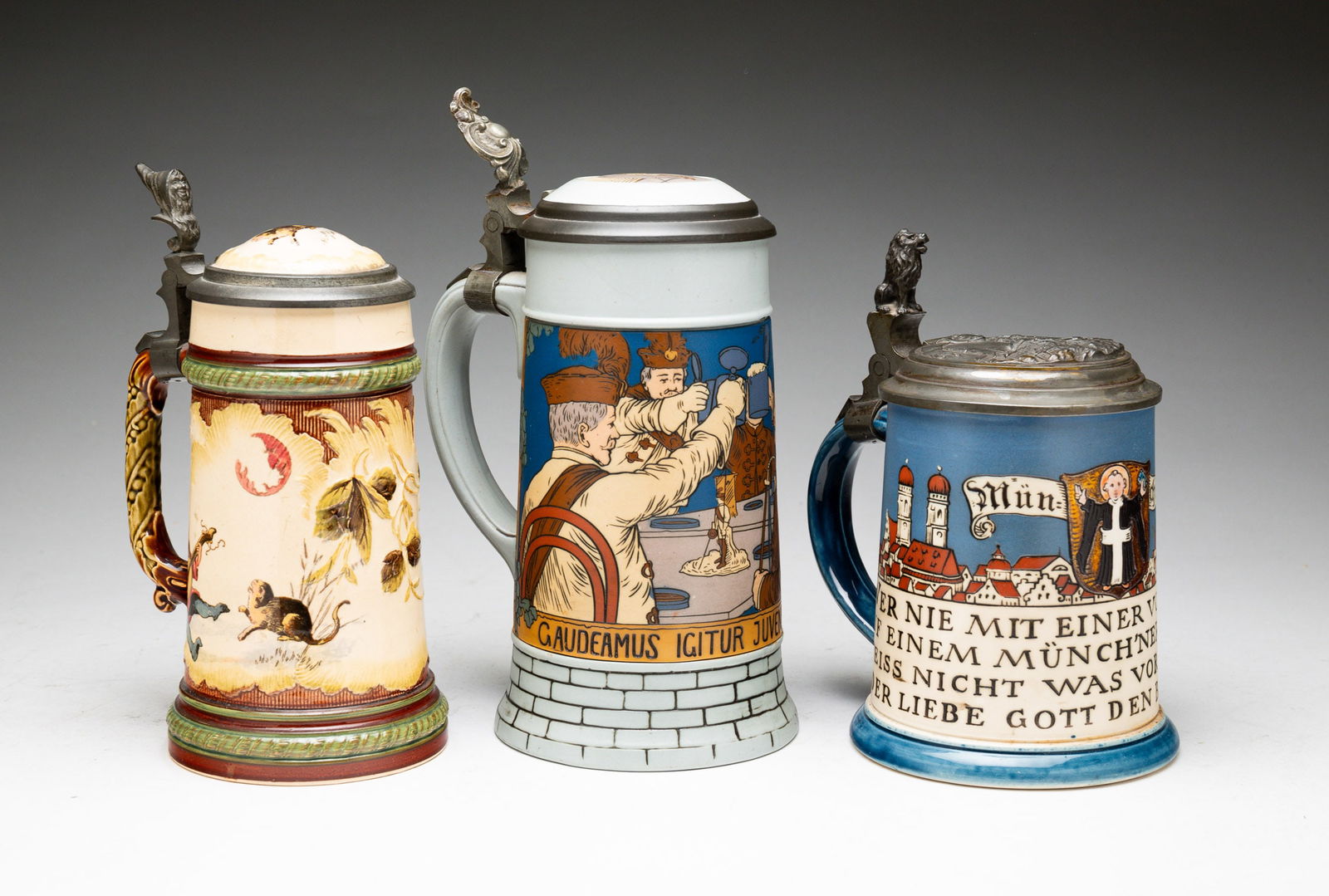 THREE METTLACH STEINS. (1 of 8)