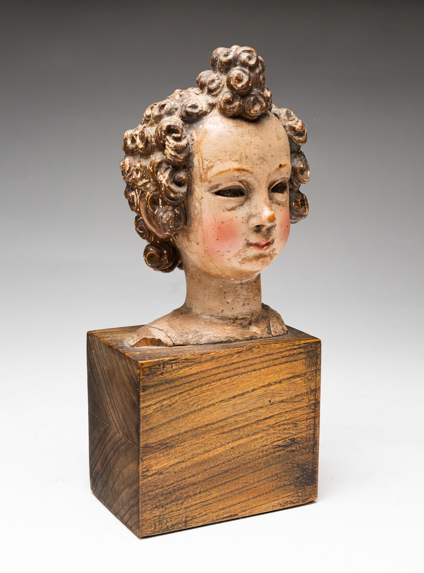 WOOD CARVED PAINTED BUST ON BASE. (1 of 4)