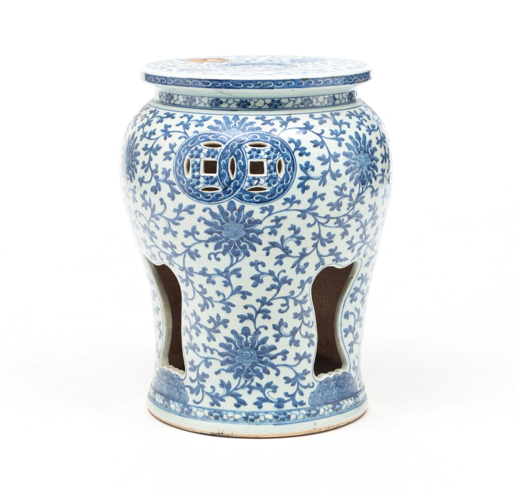 PORCELAIN GARDEN SEAT.: Chinese, early 20th Century. Hand decorated with flowers, pierced medallion designs. Old paper label "Made in China". 18.75"h. 14"d.