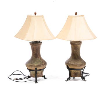 PAIR OF TABLE LAMPS.: One is a Han Period, Chinese pottery vase and the second is a "Jo Mead Designs" resin reproduction. Both are on iron tripod bases and have double pull chain fixtures. 31.5"h. Include shades.