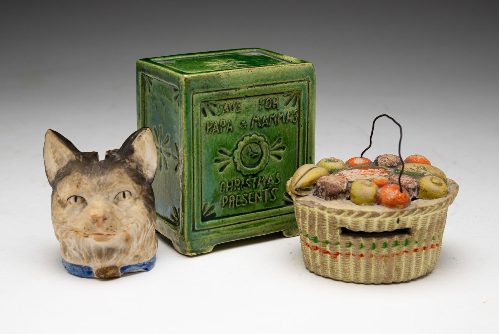 THREE POTTERY BANKS. (1 of 4)