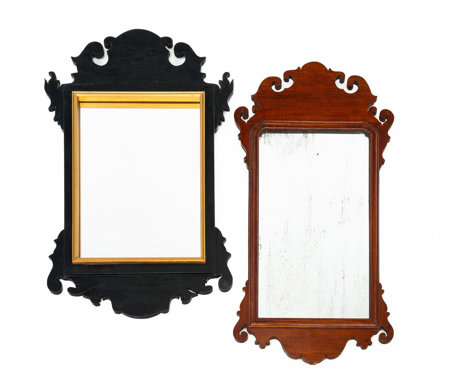 TWO WOOD FRAMED SCROLL MIRRORS. (1 of 4)