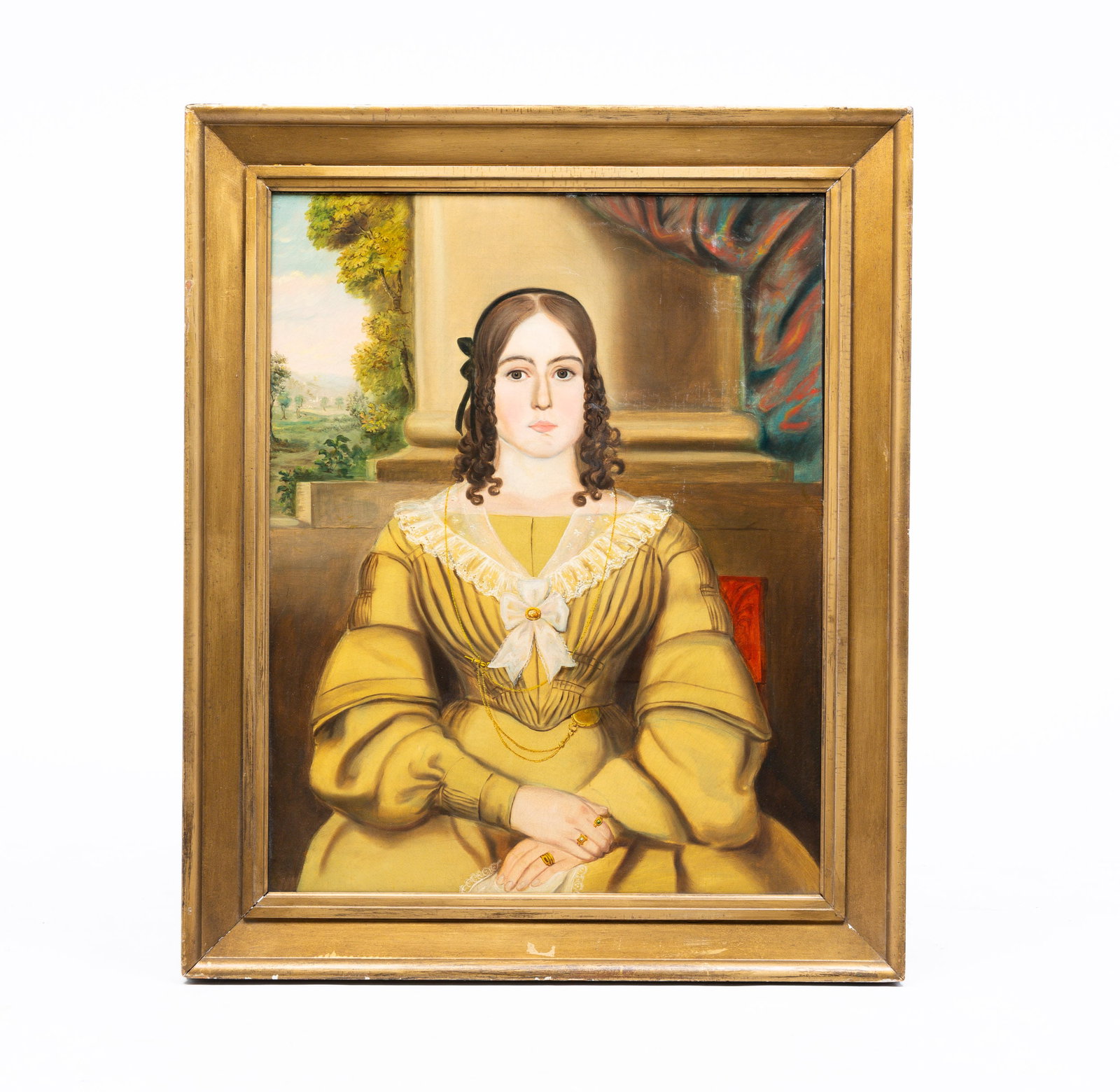 UNKNOWN ARTIST "PORTRAIT OF A YOUNG LADY".: American, mid 19th Century. Oil on canvas. Very balanced naive scene, she has brown hair in ringlets, a pale yellow dress with lace collar, a pocket watch with chain and crossed hands with rings on fi