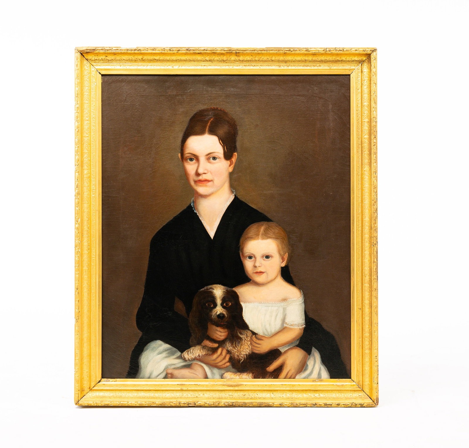ATTRIBUTED TO LEWIS D. BRUCE "PORTRAIT OF MOTHER AND CHILD".: American, second-quarter 19th Century. Oil on canvas. Attributed to Lewis D. Bruce. The sitter is Frances Regeldea and painted in 1842 on pencil inscription on frame. She wears a "V" neck dress with l
