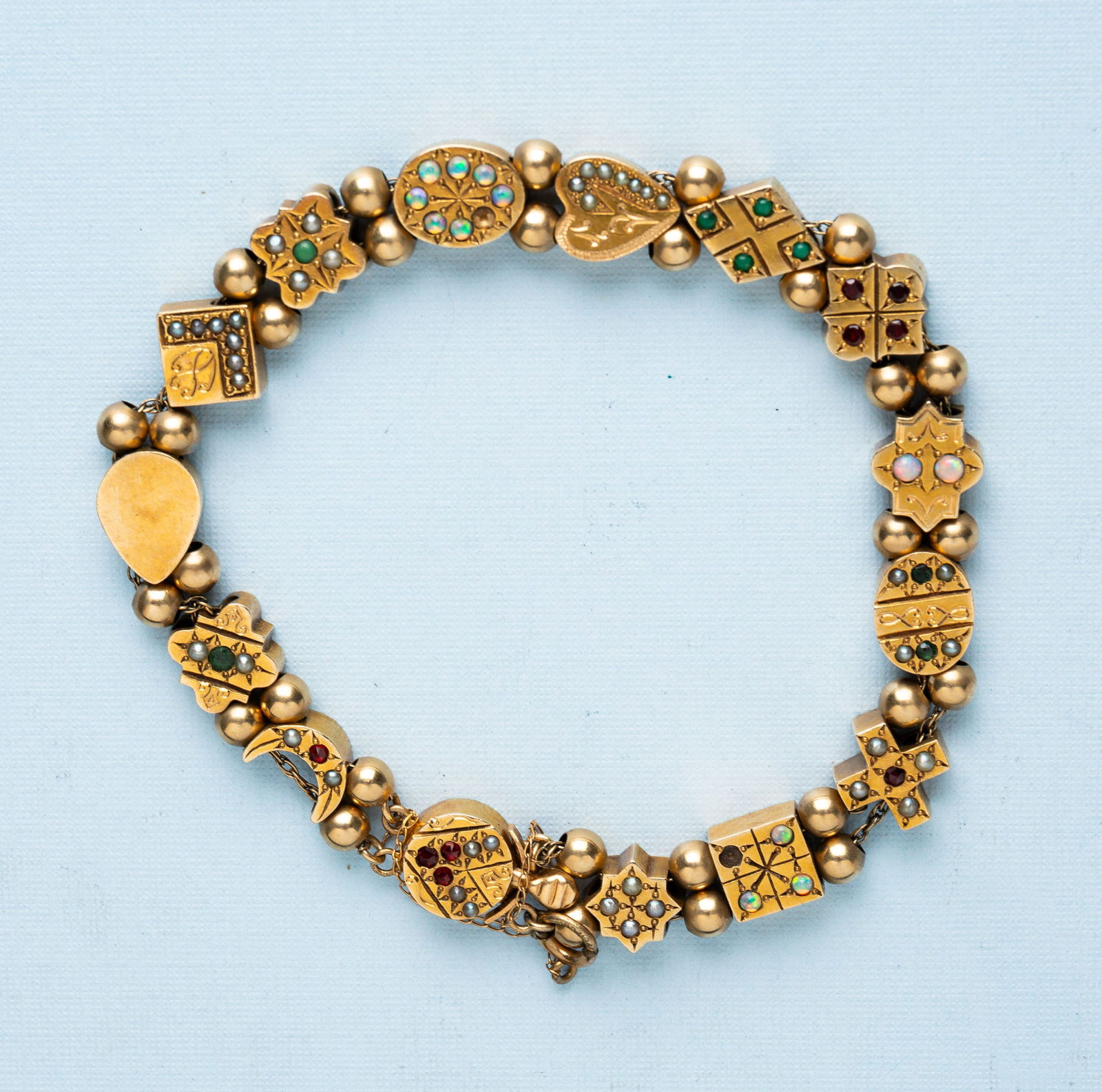 VINTAGE GOLD AND GEMSTONE SLIDE BRACELET. (1 of 3)