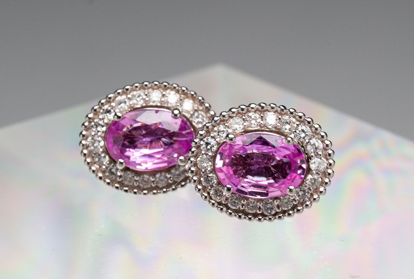 WHITE GOLD, PINK SAPPHIRE AND DIAMOND STUD EARRINGS. (1 of 3)