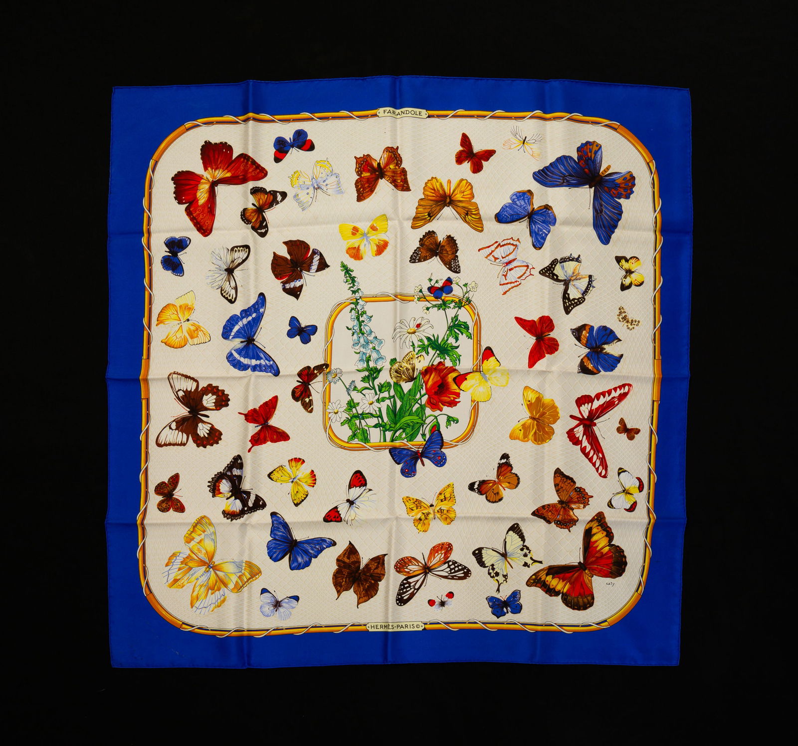 HERMES SILK 90 "FARANDOLE" SCARF WITH BLUE BORDER.: Silk. Butterflies surrounding a floral center. 35" square. In original box.