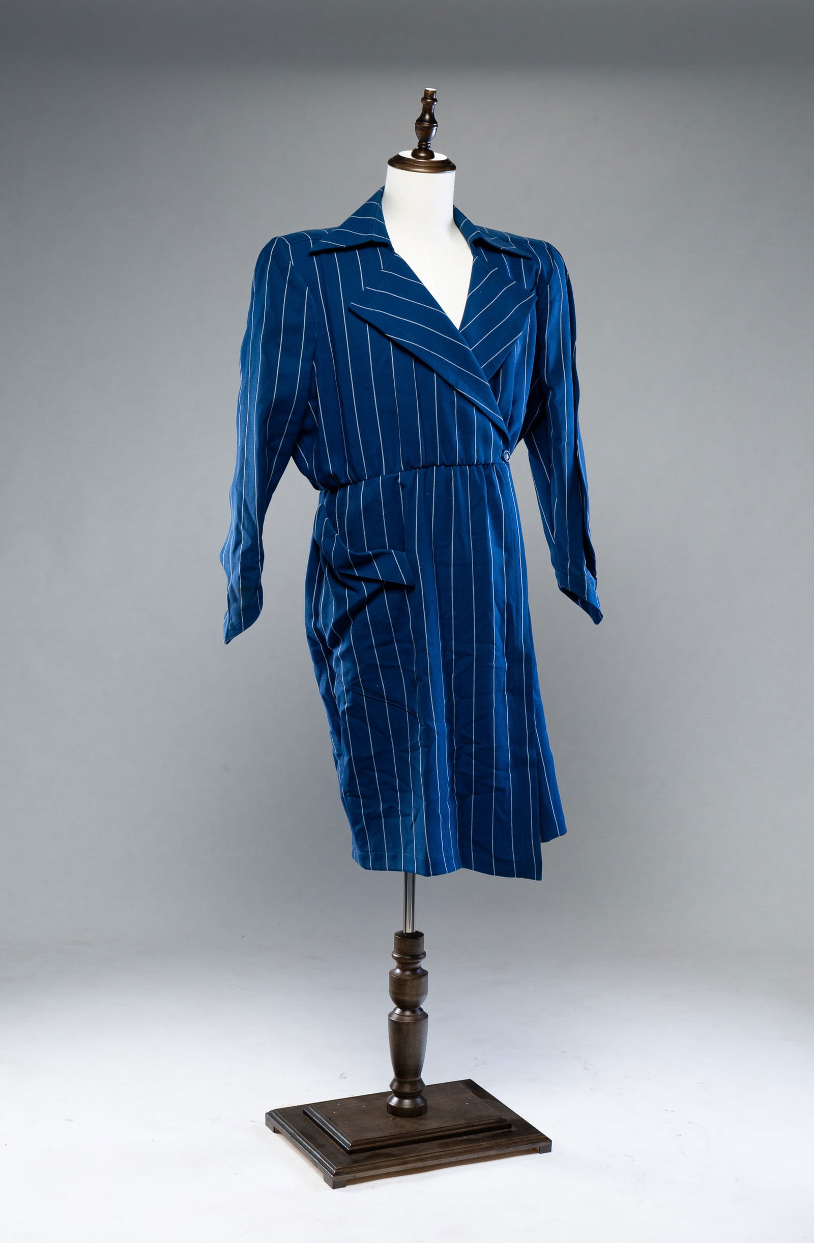 TWO DESIGNER COATS.: French. Size 42. Thierry Mugler pin stripe blue jacket, and a Guy Laroche grey wool coat.