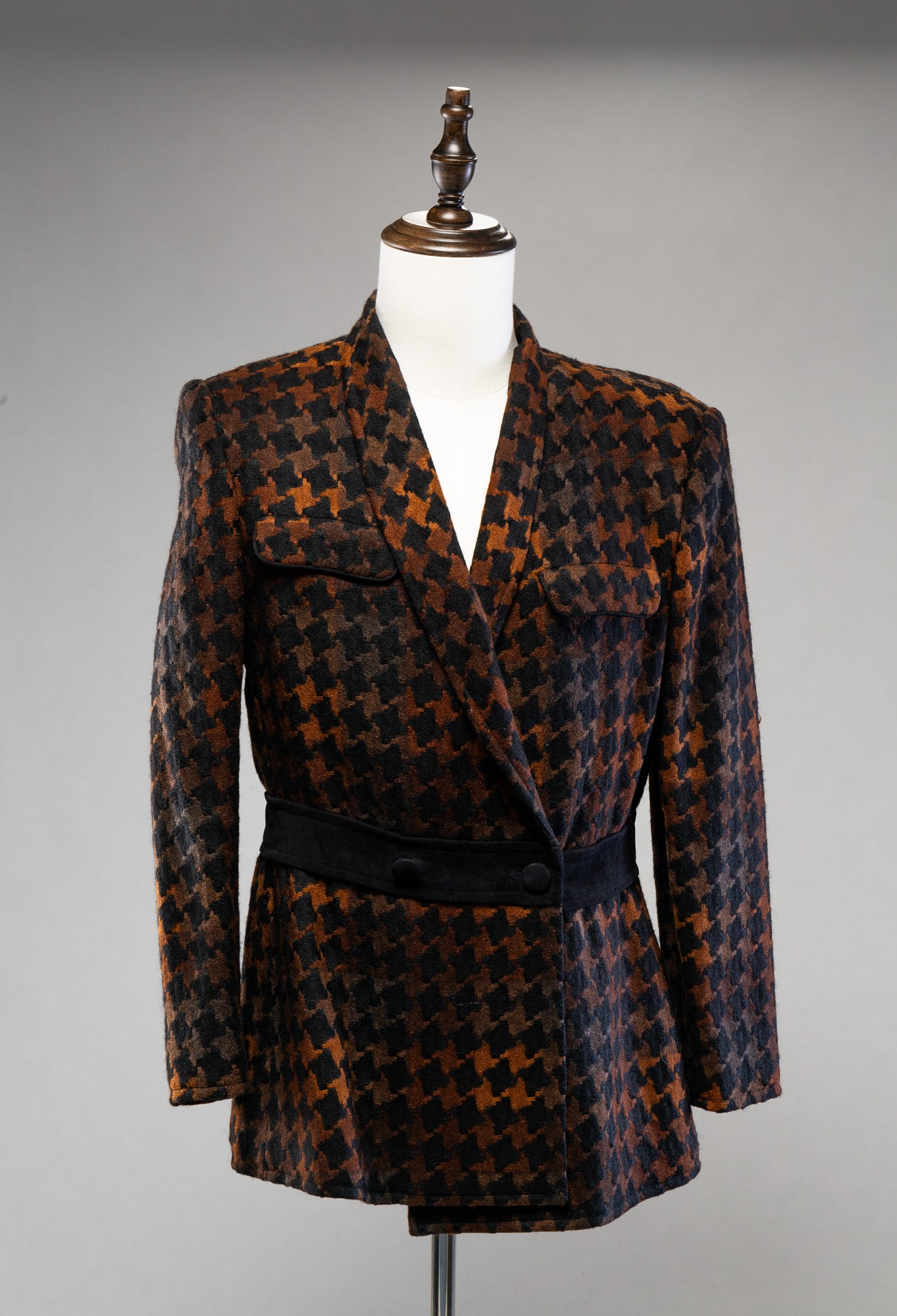GUCCI TWO PIECE SKIRT SUIT.: Italian. Wool and suede. Size 46. Houndstooth blazer with black pencil skirt. Light wear.