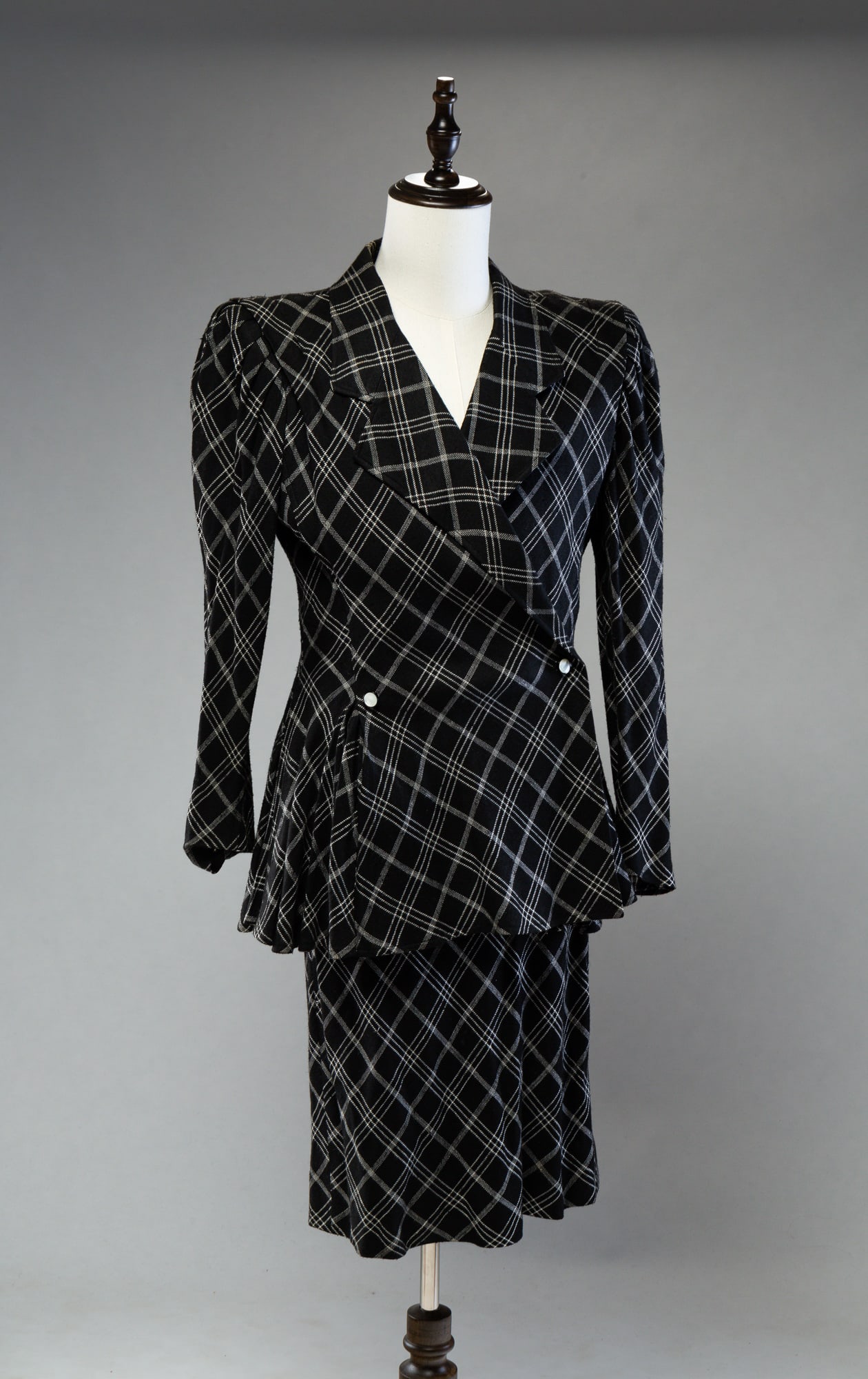 UNGARO SKIRT SUIT.: French. Size 12. Black and white plaid skirt with matching blazer. Shoulder pads.