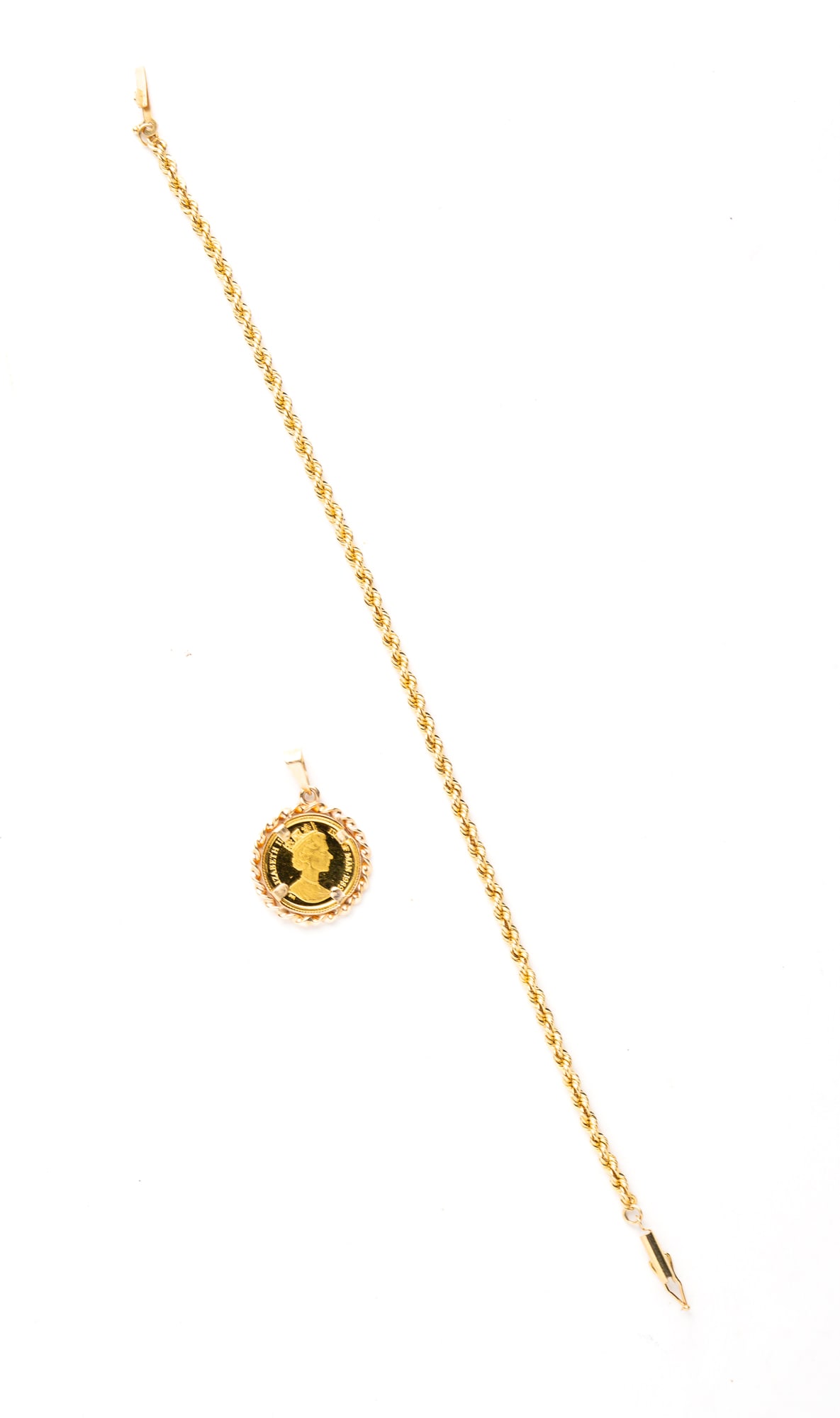 TWO PIECES OF GOLD JEWELRY. (1 of 1)