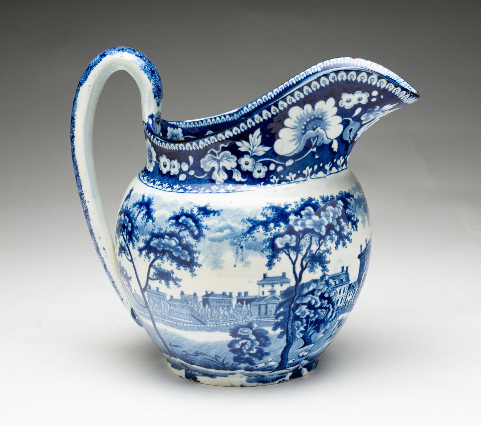HISTORICAL BLUE STAFFORDSHIRE PITCHER.: HISTORICAL BLUE STAFFORDSHIRE PITCHER. England, second quarter 19th Century. American scene of "Boston Statehouse" by Rogers. Eagle transfer mark on bottom. Light crazing. 8"h.