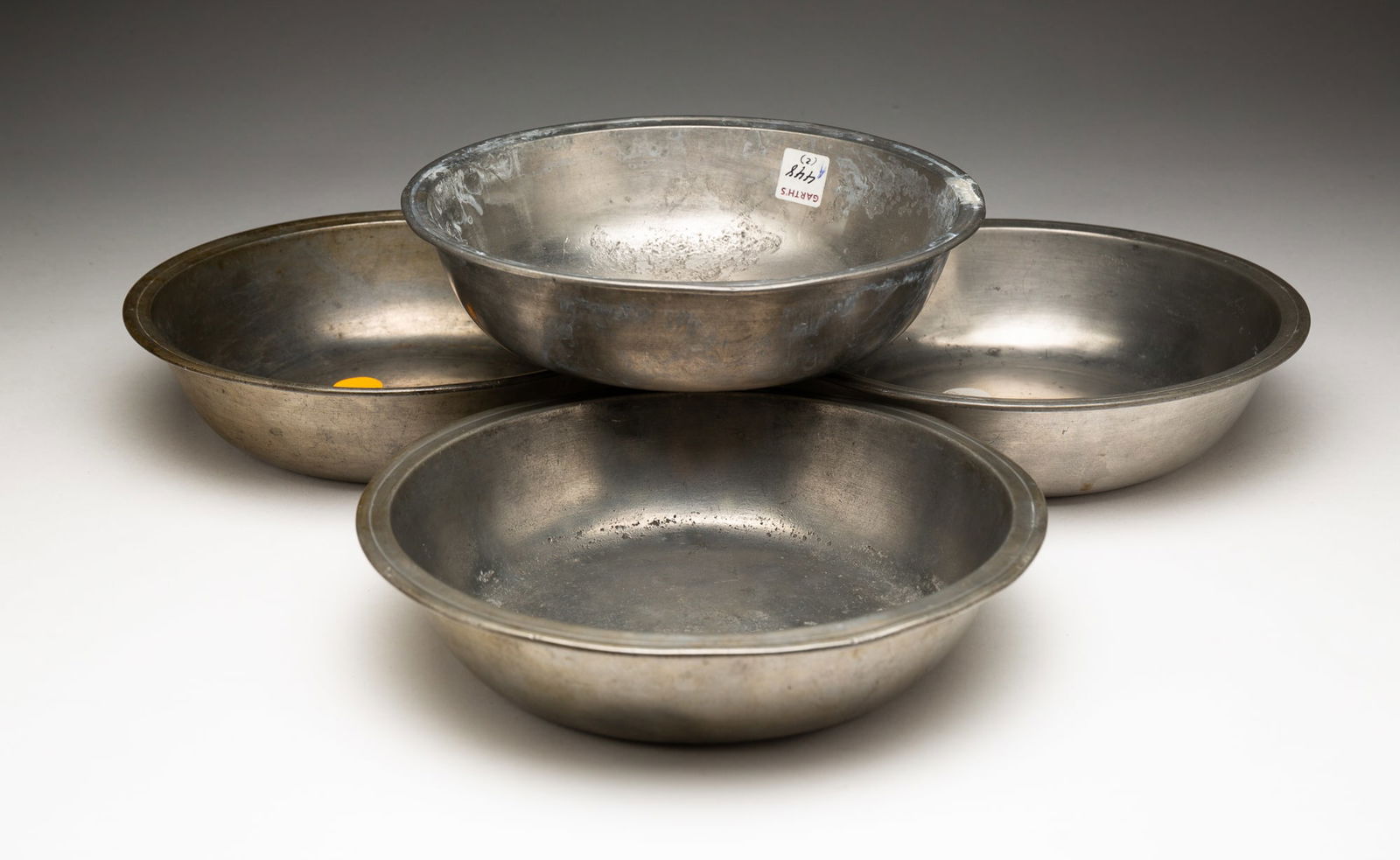 FOUR PEWTER BASINS. (1 of 5)
