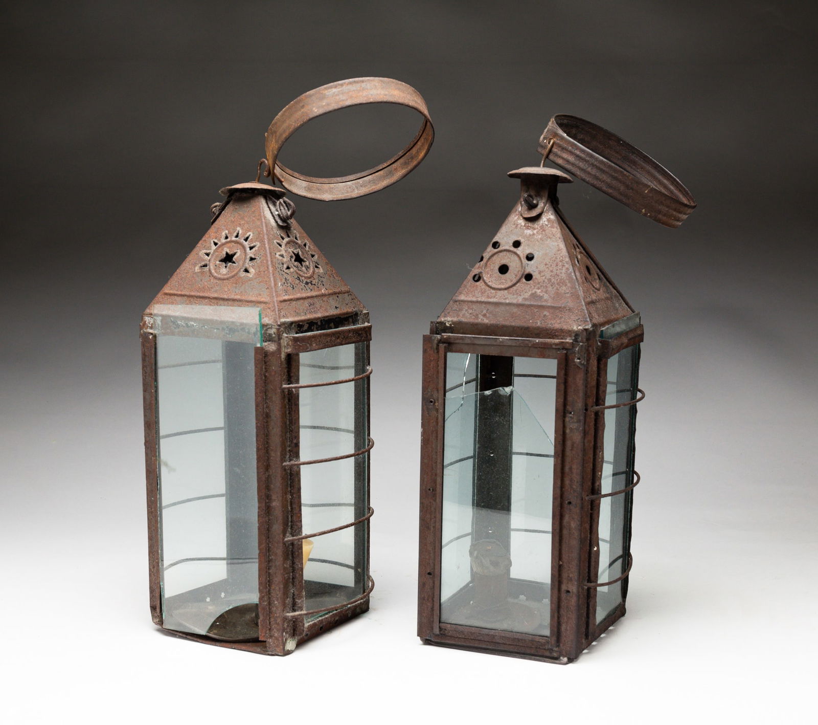 TWO TIN CANDLE LANTERNS. (1 of 3)