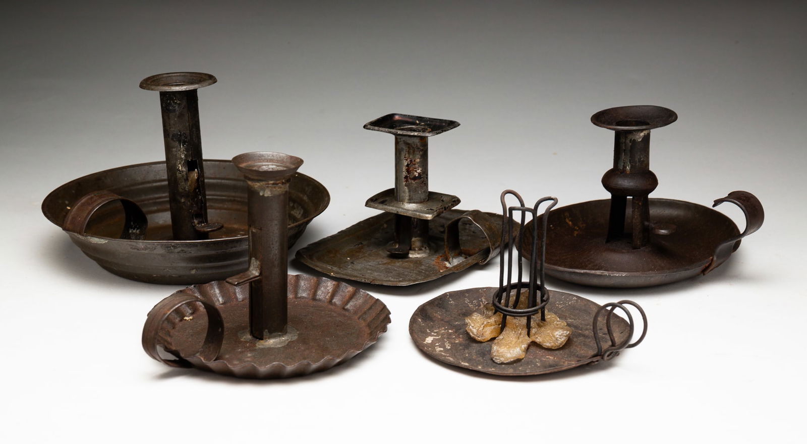 GROUP OF TIN CANDLESTICKS. (1 of 3)