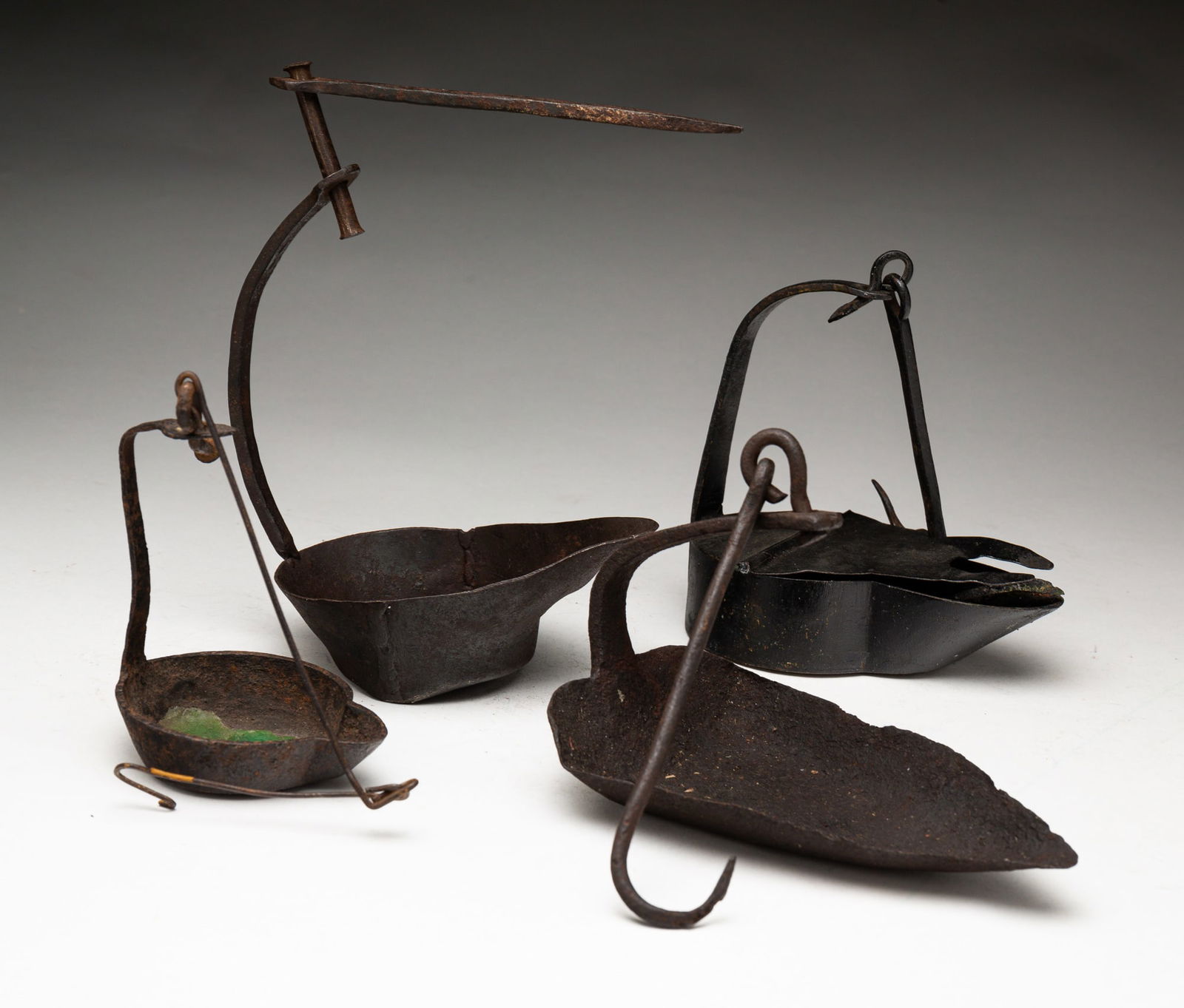 FOUR GREASE LAMPS. (1 of 3)