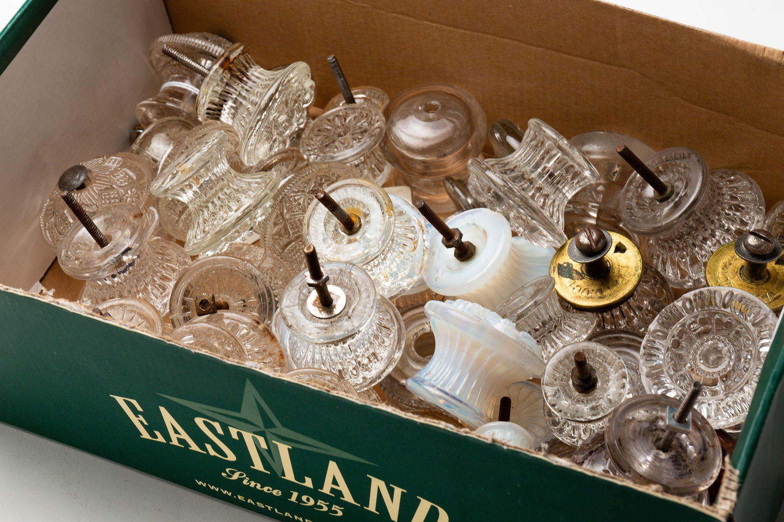 COLLECTION OF PRESSED AND BLOWN DRAWER KNOBS. (1 of 3)