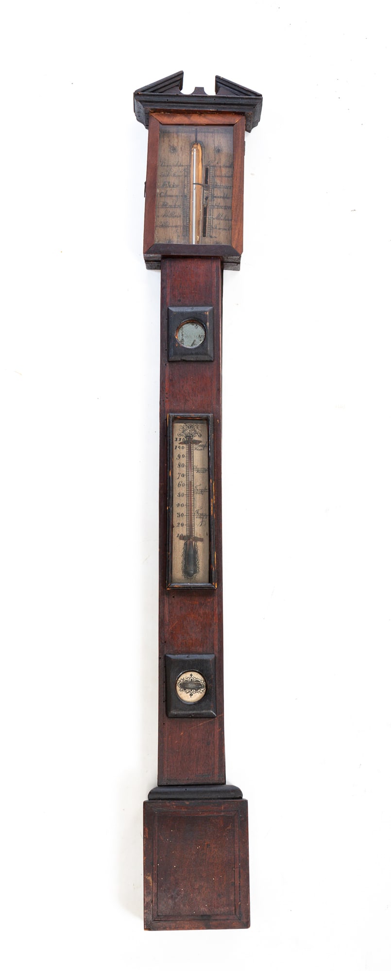 BAROMETER.: England, mid-19th Century. Mahogany. Broken arch pediment, sealed mercury barometer and thermometer tubes, mirrored medallion and old worn finish. 37"h. 6"w. 2"d.