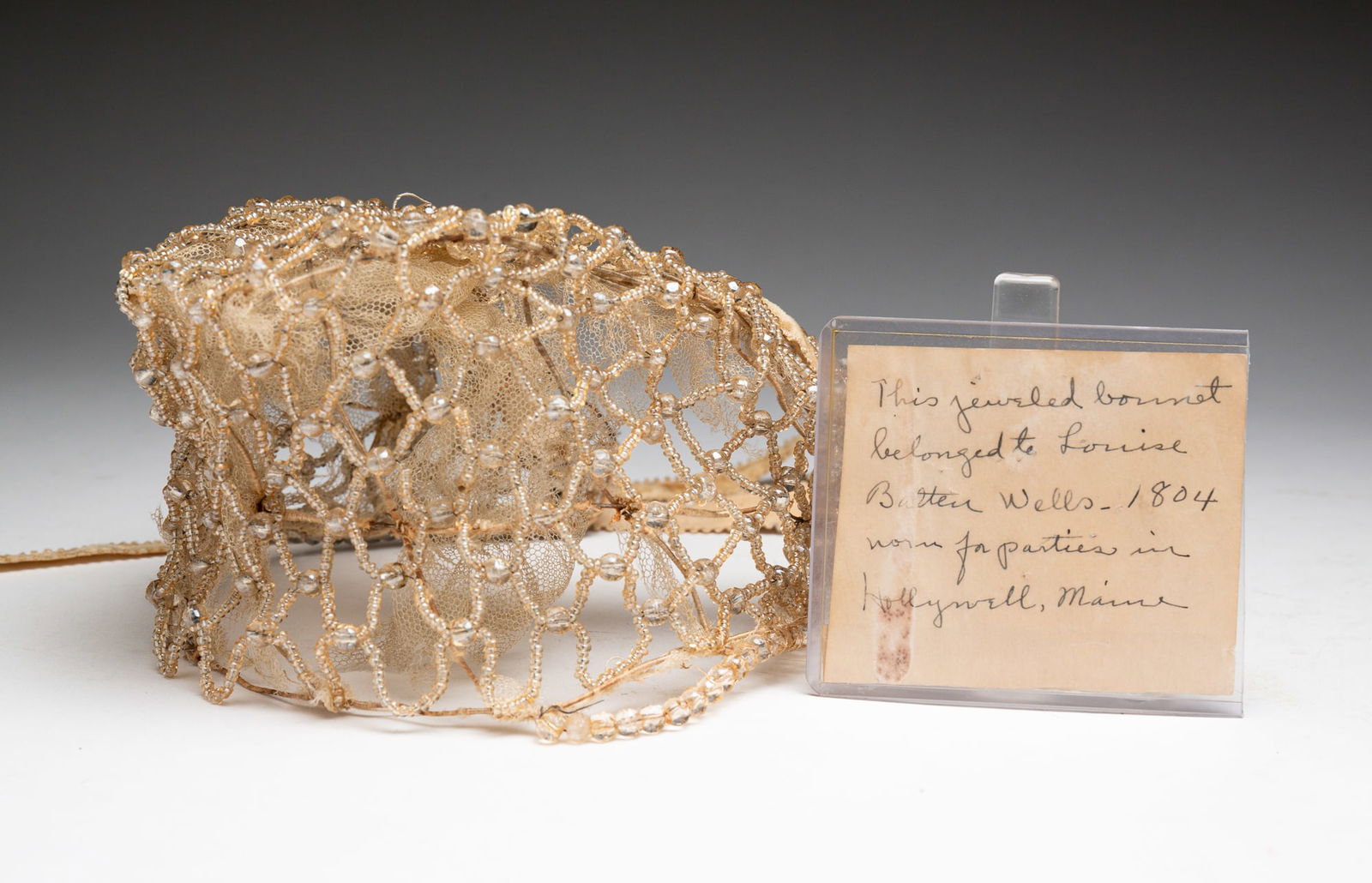 QUARTZ BEADED BONNET. (1 of 3)