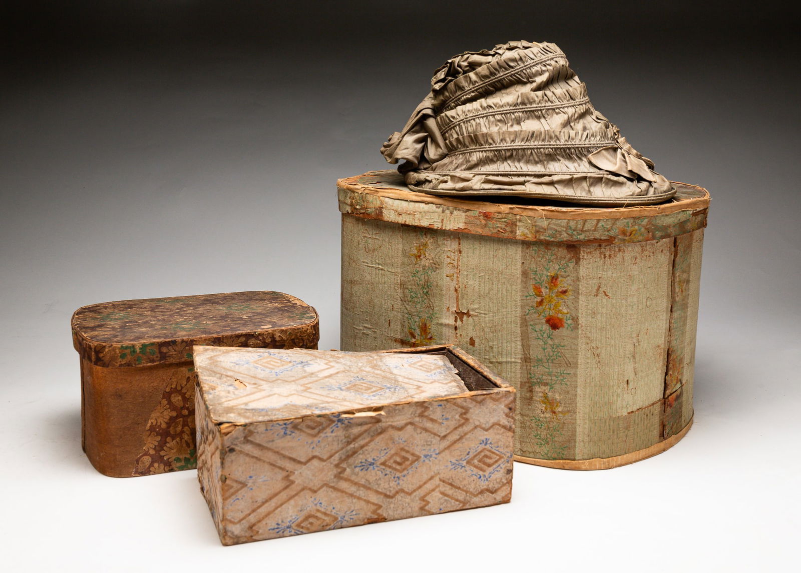 THREE WALLPAPER COVERED BOXES. (1 of 6)