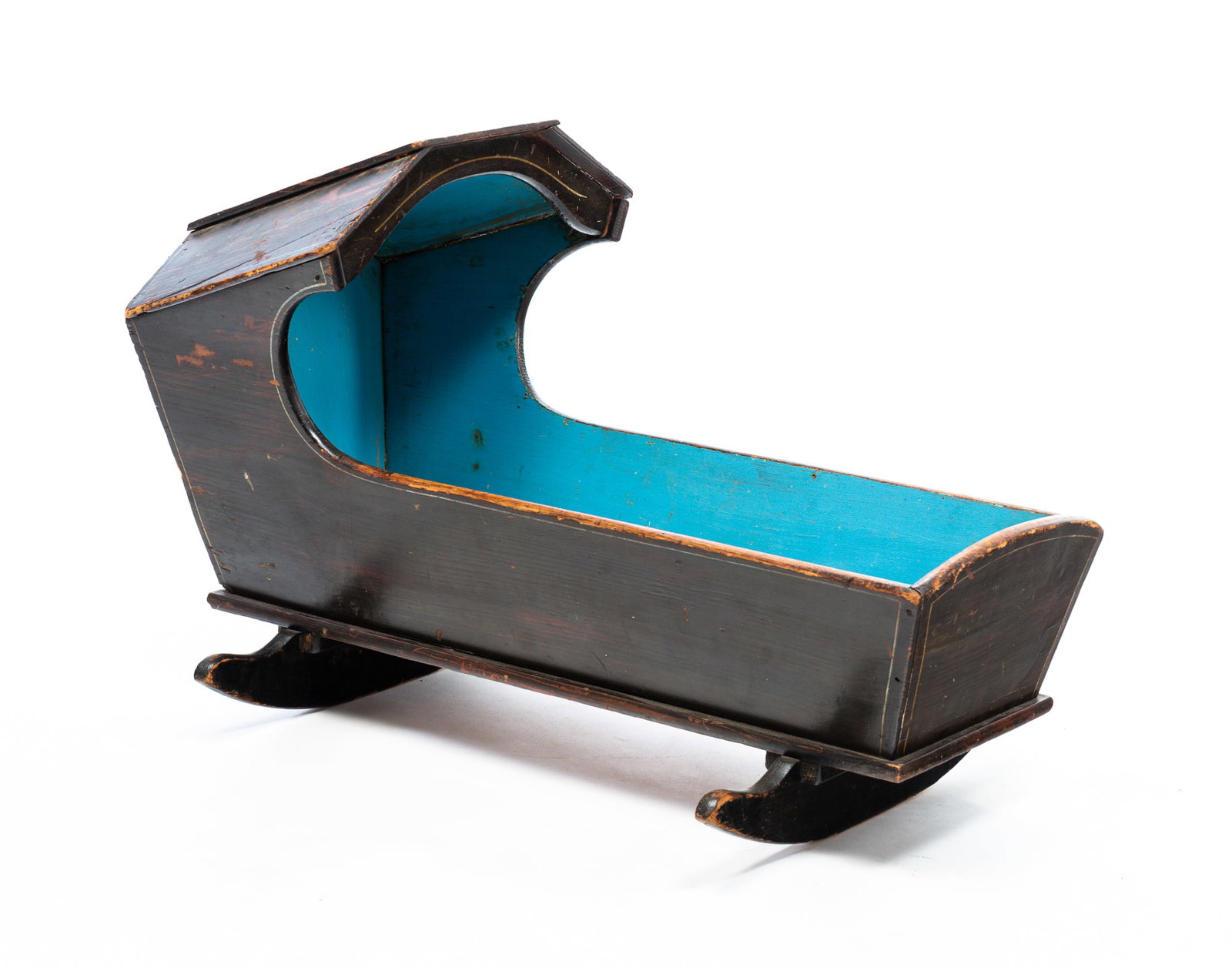 GRAIN PAINTED AND STENCILED CRADLE.: American, mid-19th Century. Soft woods. Wooded form with black over red graining, gold stenciled swans, fountains and flourishes and blue interior. Some wear and loss. 25"h, 23"w. 37"l.