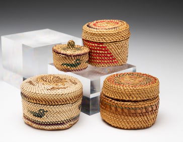 FOUR MINIATURE MAKAH PICTORIAL BASKETS.