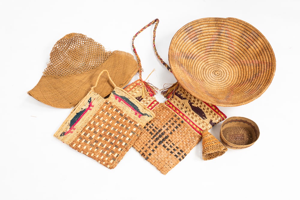 GROUP OF MAKAH, NOOTKA, AND ALASKAN BASKETRY.: Makah, Nootka and Alaskan, first half 20th Century. Six pieces of basketry, some with unknown usage, decorated with geometric designs and animal motifs. Overall good and as-is condition with minor fad