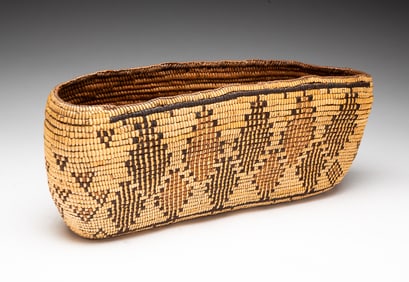 NORTHWEST COAST CANOE BASKET.