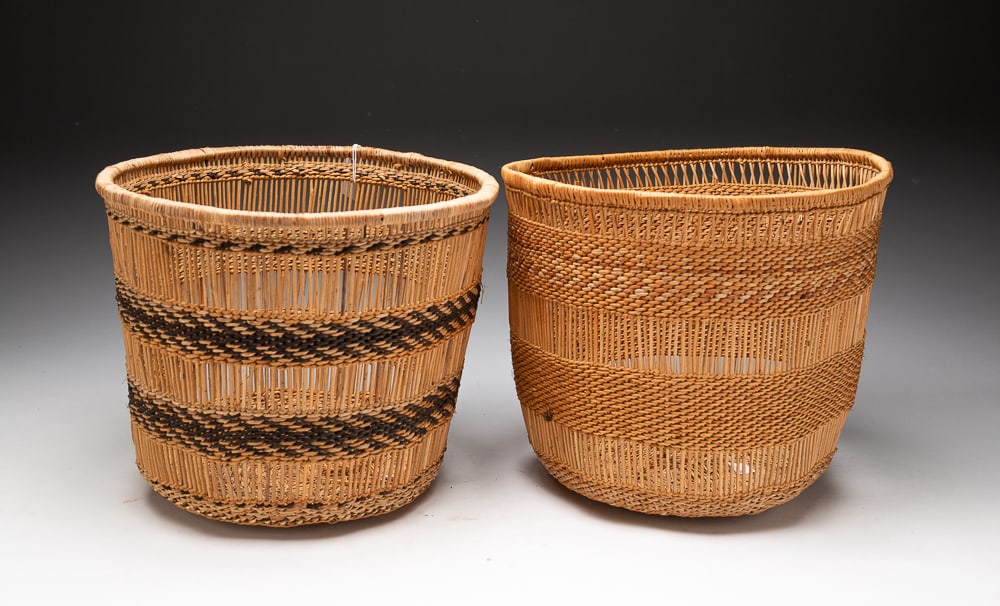 TWO NORTHWEST COAST HUPA BASKETS.: Hupa, first half 20th Century. Decorated throughout with woven, banded designs. Overall fine condition. Both 9"h. 11"dia.We do not guarantee tribal attributions for American Indian / First Nations ite