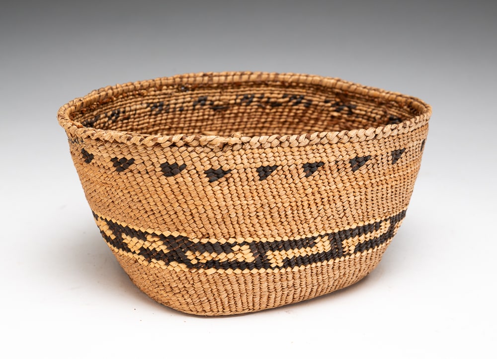NOOTKA OR HAIDA FINE BASKET.: Nootka or Haida, early-20th Century. Small basket with nice design. Overall good condition. 3.75"h. 7"dia.We do not guarantee tribal attributions for American Indian / First Nations items.
