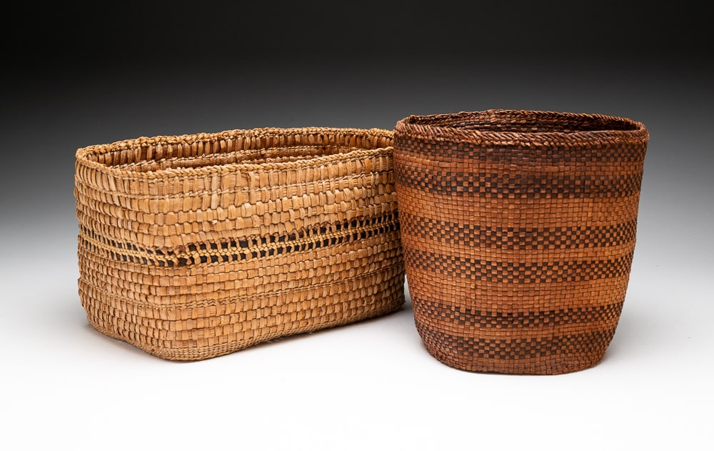 TWO NORTHWEST COAST BASKETS.: Late-19th Century. Haida Cedarbark basket. Very good condition. 7.5"h. 7.5"dia.Early-20th Century. 11"h. 6"dia.We do not guarantee tribal attributions for American Indian / First Nations items.