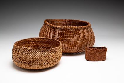 THREE NORTHWEST COAST BASKETS.
