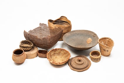 ELEVEN ASSORTED NORTHWEST COAST FIRST NATIONS BASKETS.