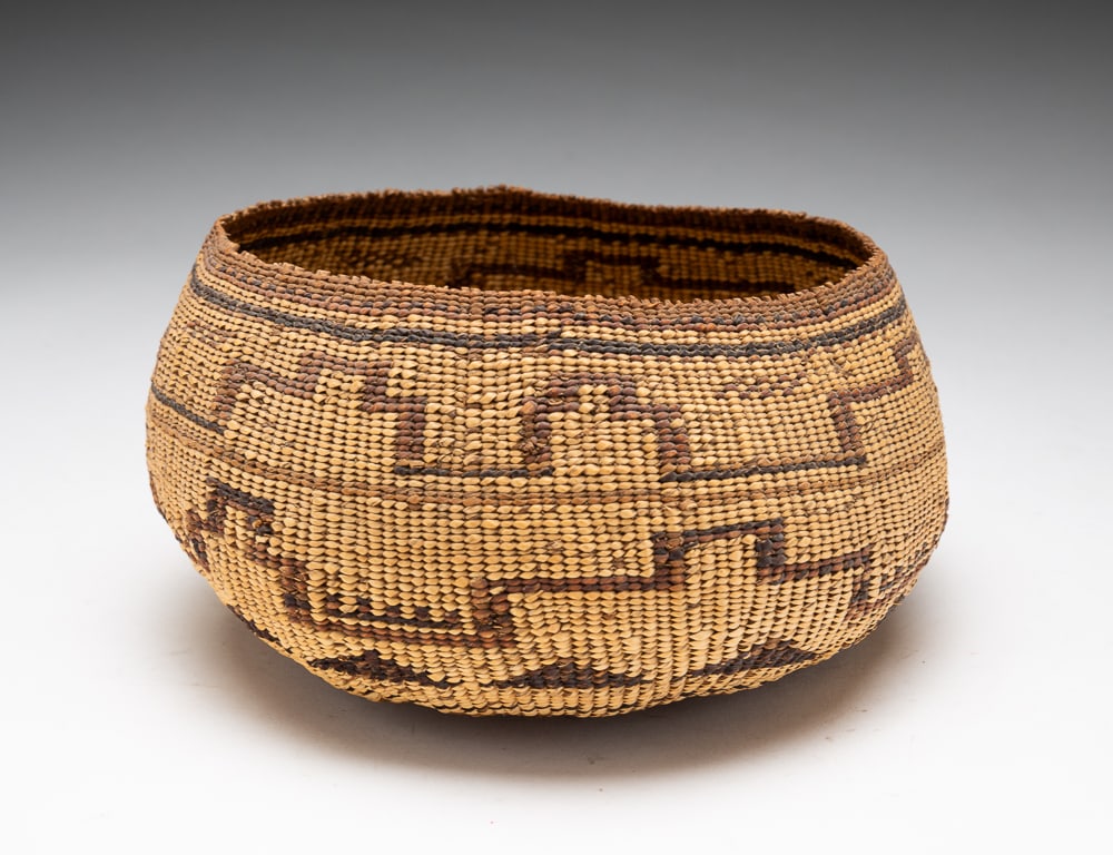 NORTHERN CALIFORNIA BASKET.: Atsugewi, 1880 to 1920. Overall fine condition with some wear. 3.5"h. 7"dia.We do not guarantee tribal attributions for American Indian / First Nations items.