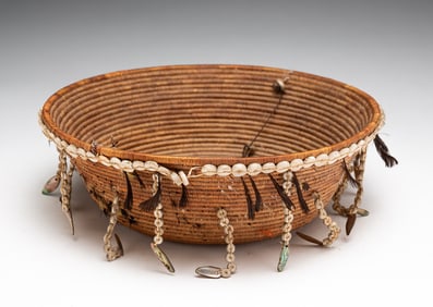 POMO BASKET WITH SHELL DANGLES.
