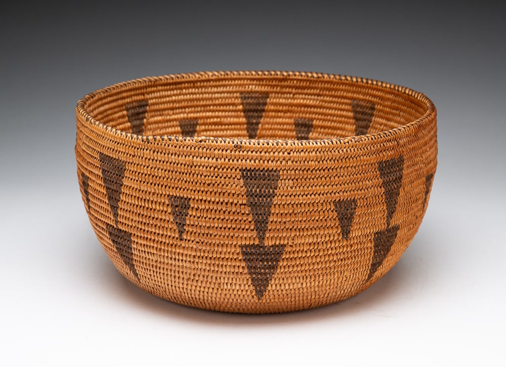 CALIFORNIA BEAR CLAW BASKET.: Early-20th Century. Black diamond design. Excellent condition. 4.5"h. 9"dia.We do not guarantee tribal attributions for American Indian / First Nations items.