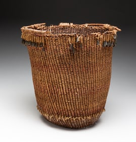 APACHE BASKET WITH TIN CONE DANGLES.