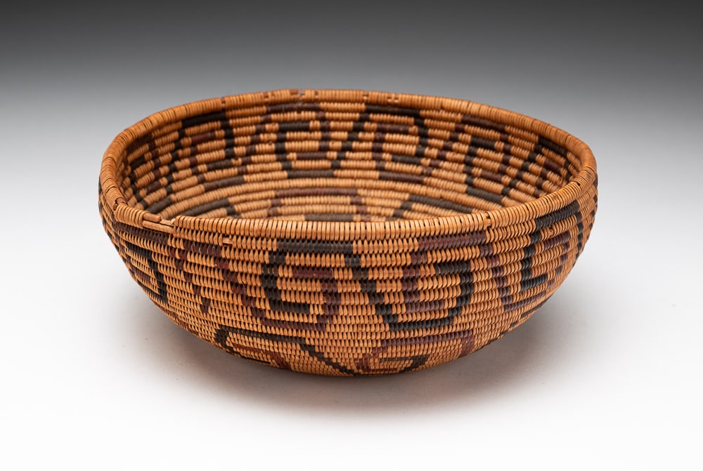 WASHOE POLYCHROME BOWL.: Washoe, circa 1900. Overall good condition with two breaks to the rim. 3"h. 7"dia.We do not guarantee tribal attributions for American Indian / First Nations items.