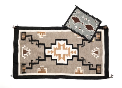 TWO CRYSTAL/GREY HILL RUGS.